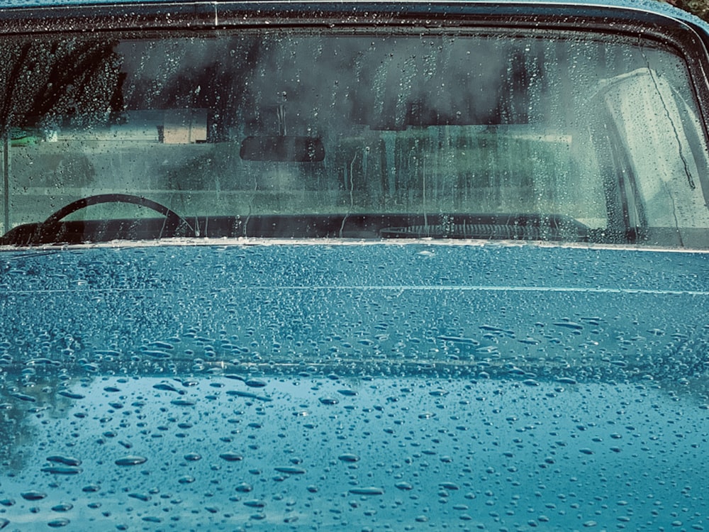 a car with water on the windshield