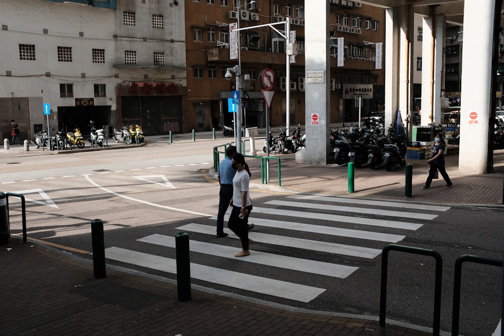 people crossing a street