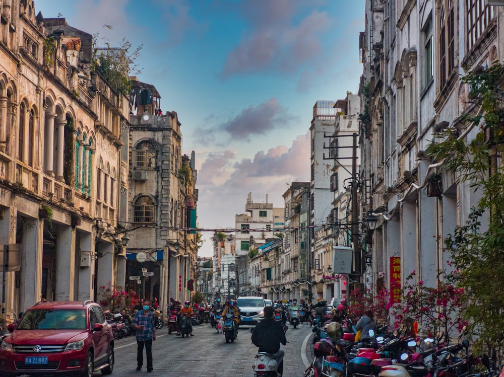 a busy street with cars and people