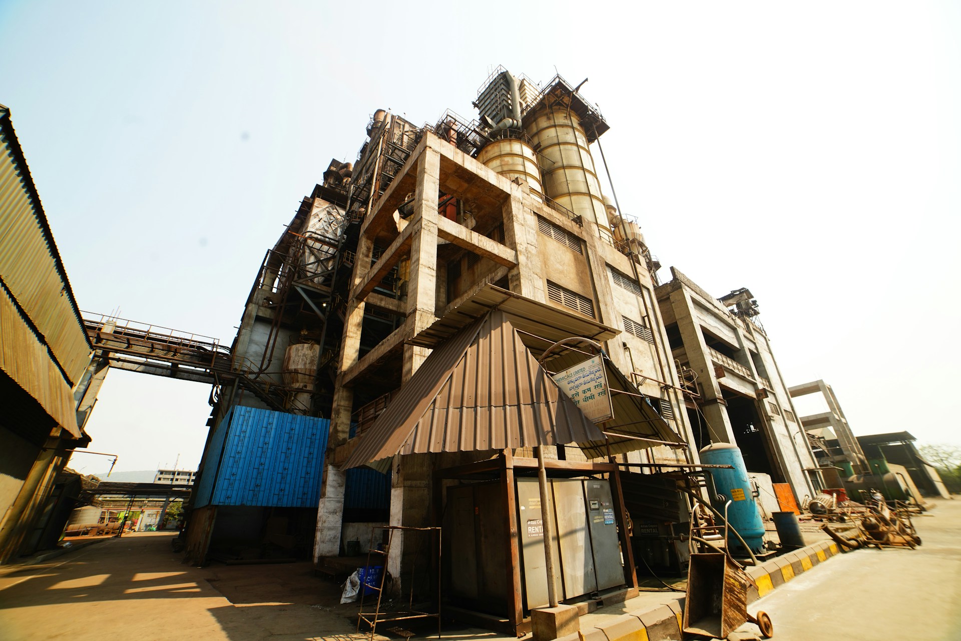 woman wearing yellow long-sleeved dress under white clouds and blue sky during daytime