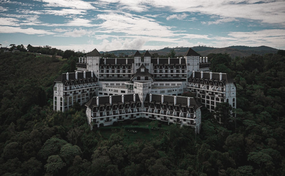 a large building surrounded by trees