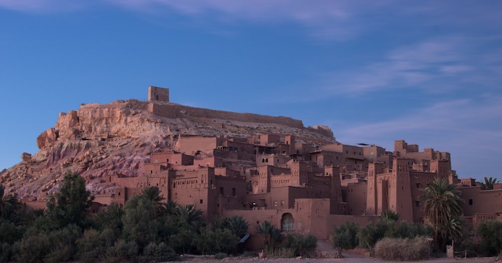 a large building on a hill