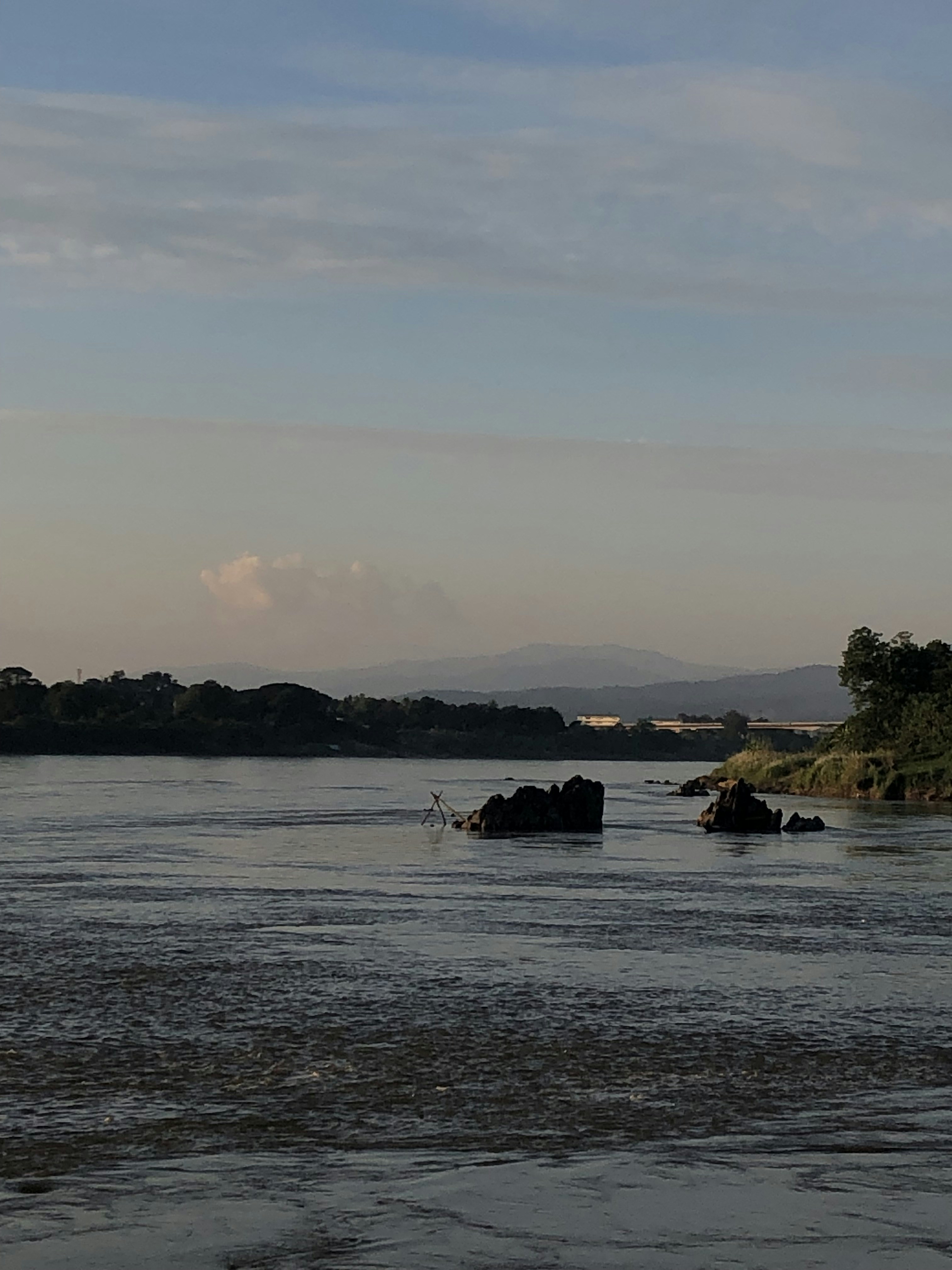The Mekong at dusk in Chiang Khong, the Lao hills opposite