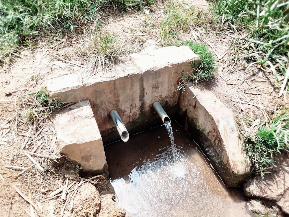 a water drainage pipe in a ditch