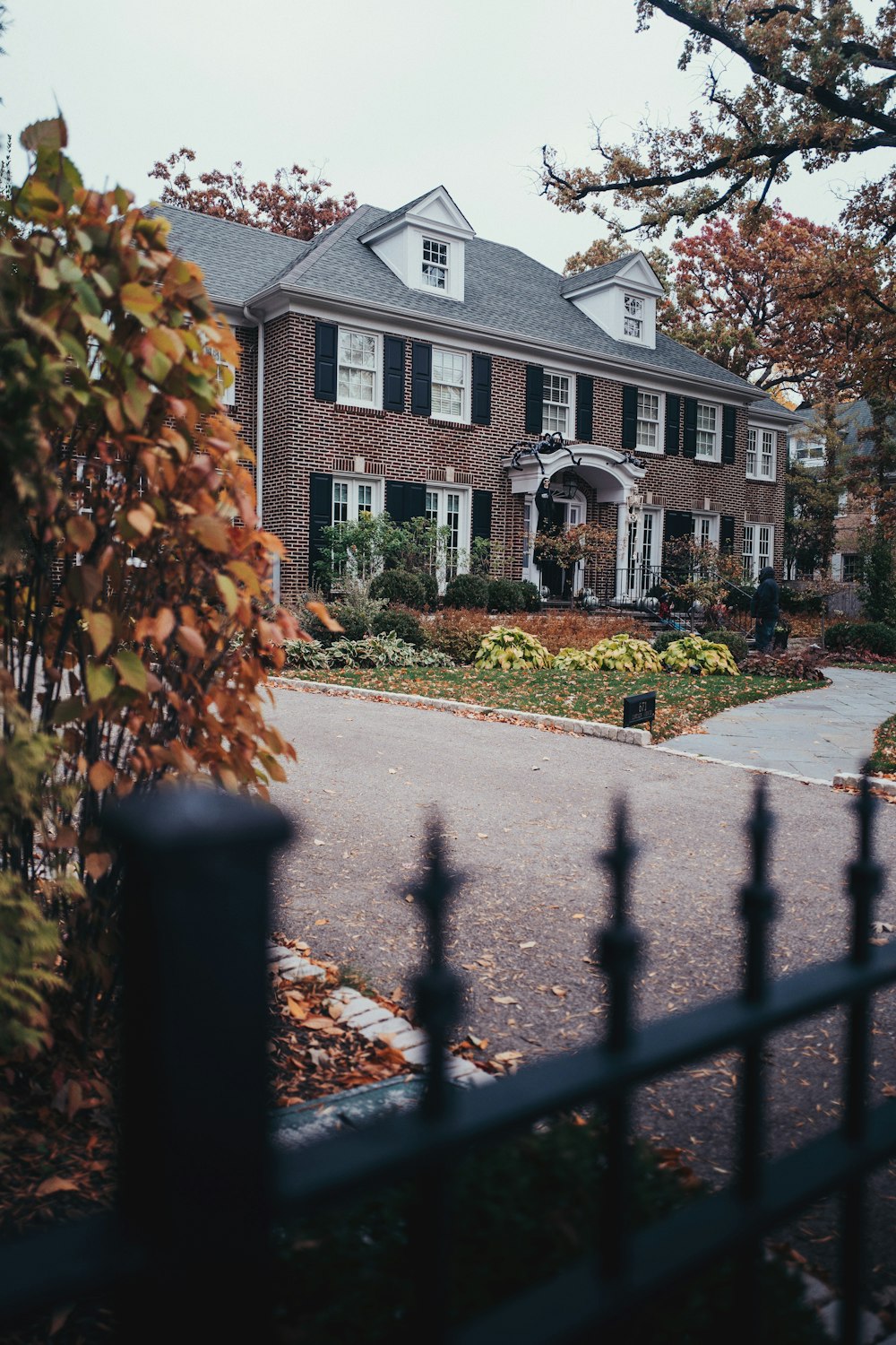 a house with a fence in front