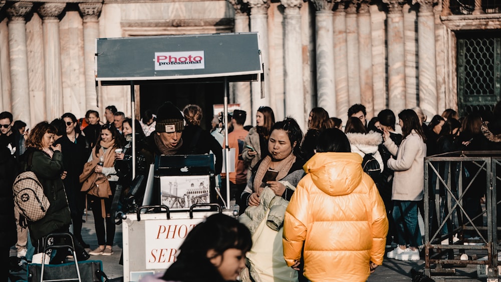 a group of people standing outside a building