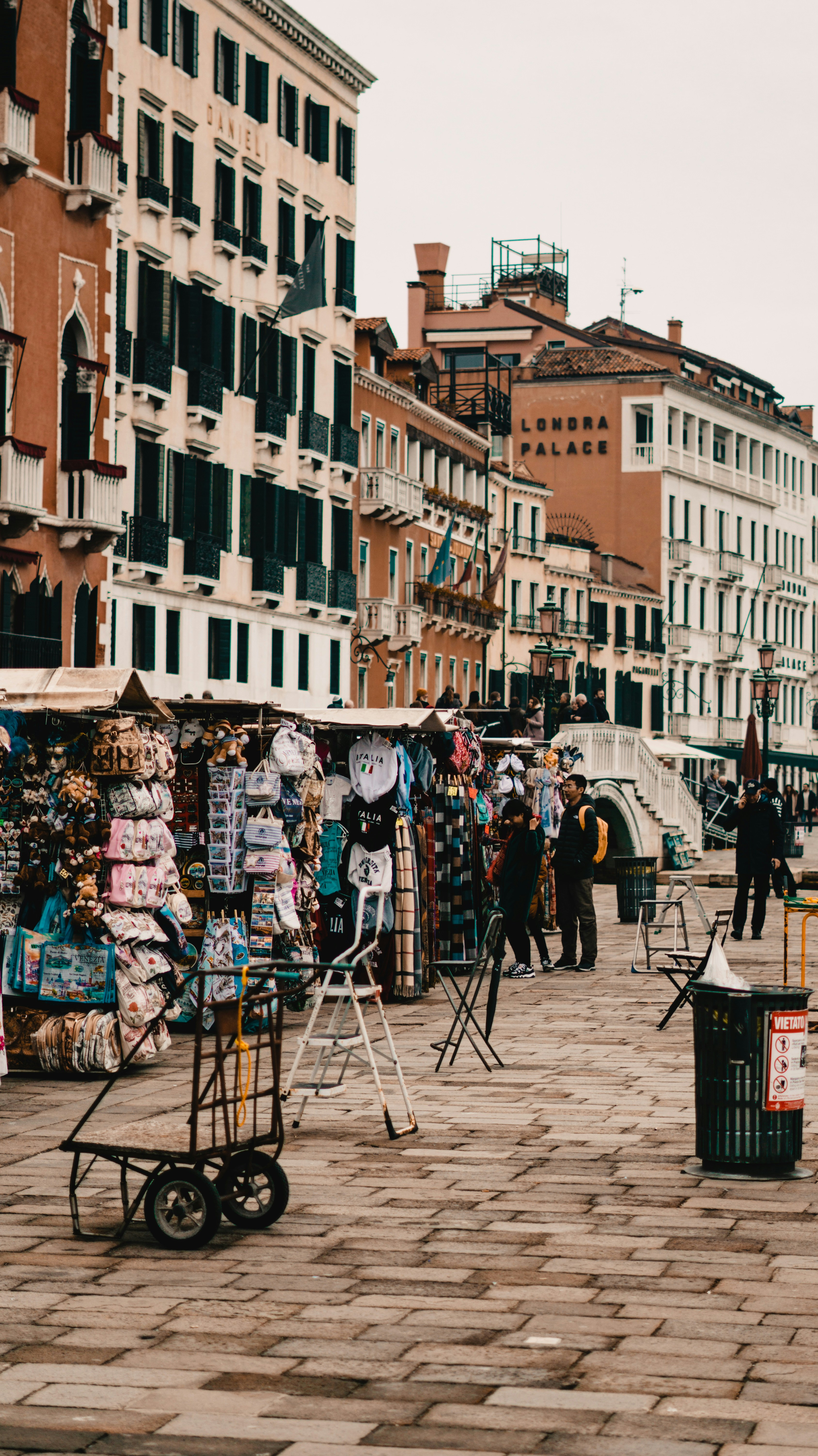 a street with buildings and people