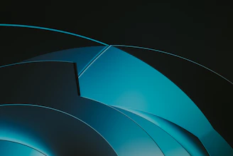 Abstract geometric shapes in white and gold on a deep blue background, evoking intellectual experimentation.