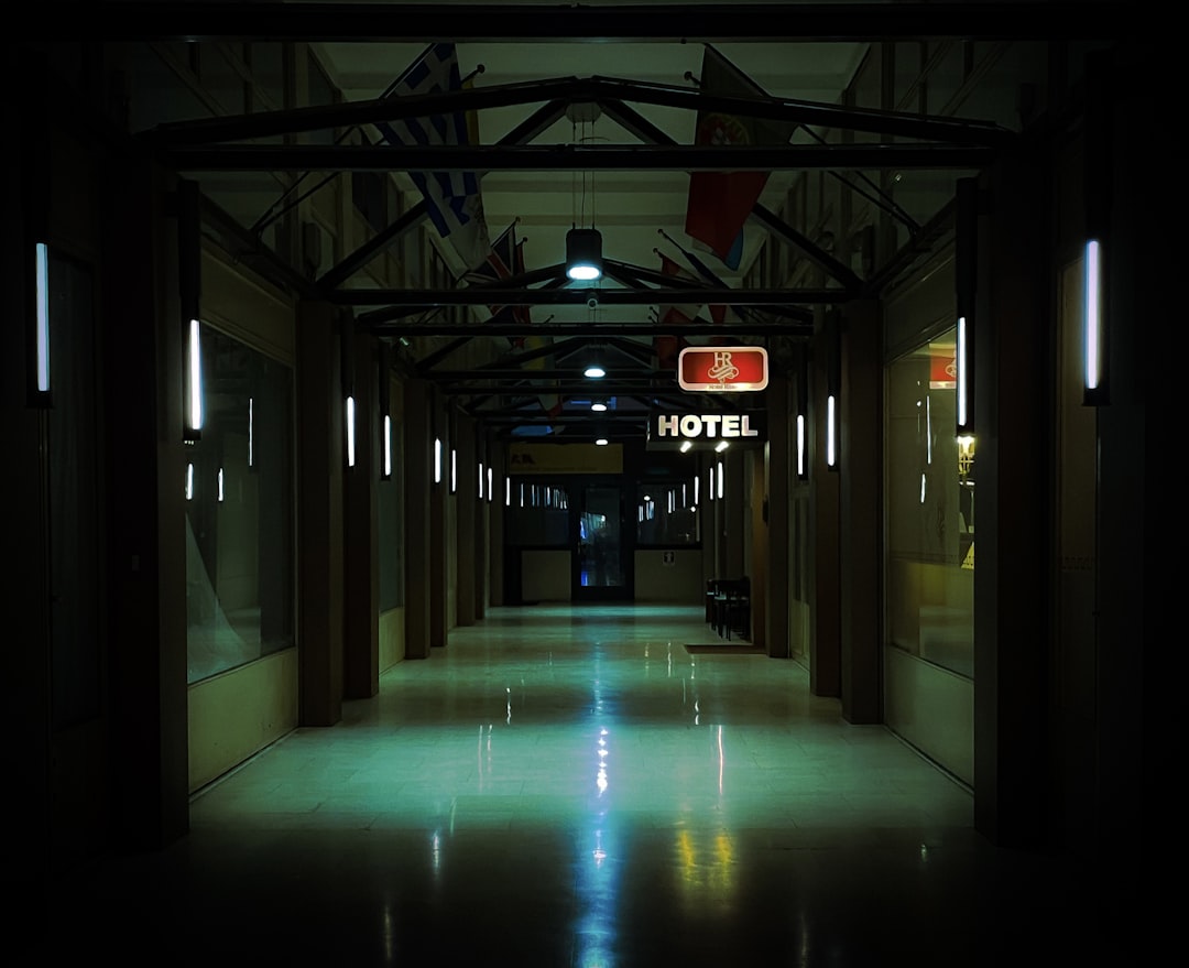a long hallway with signs,