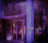 Clean, bright commercial building entrance with pastel-colored accents.
