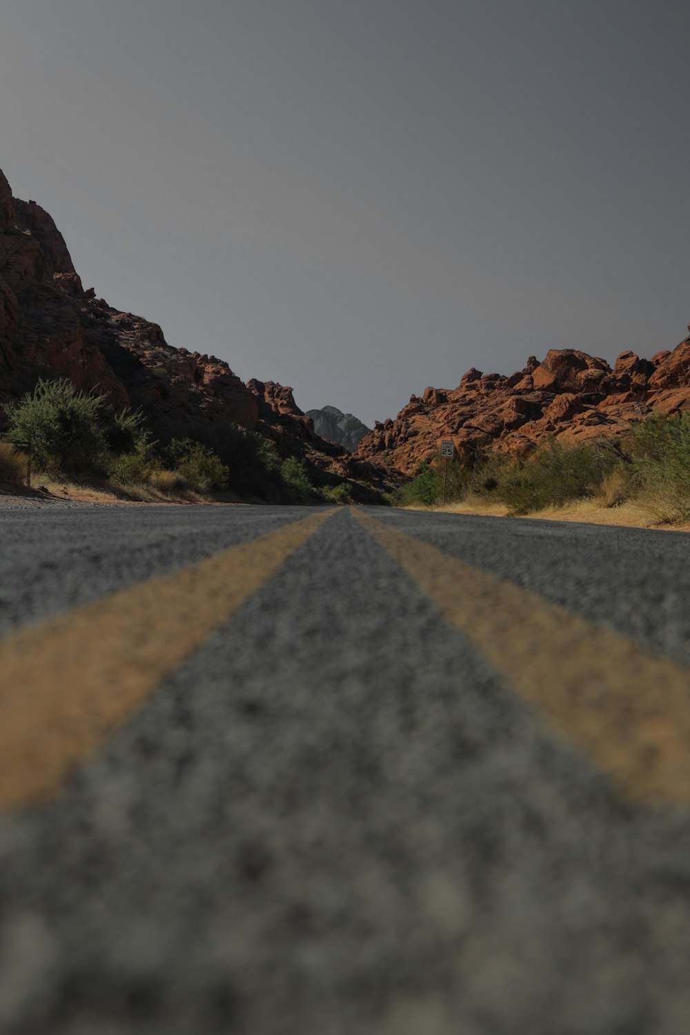 a road with rocks on the side