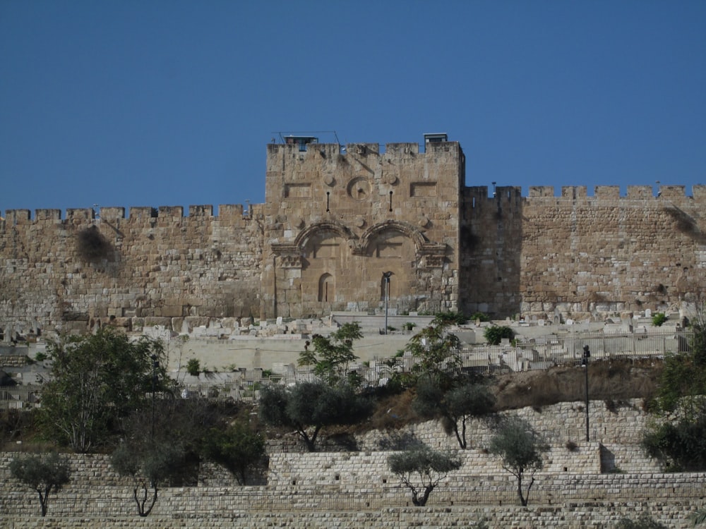 a stone building with a large tower