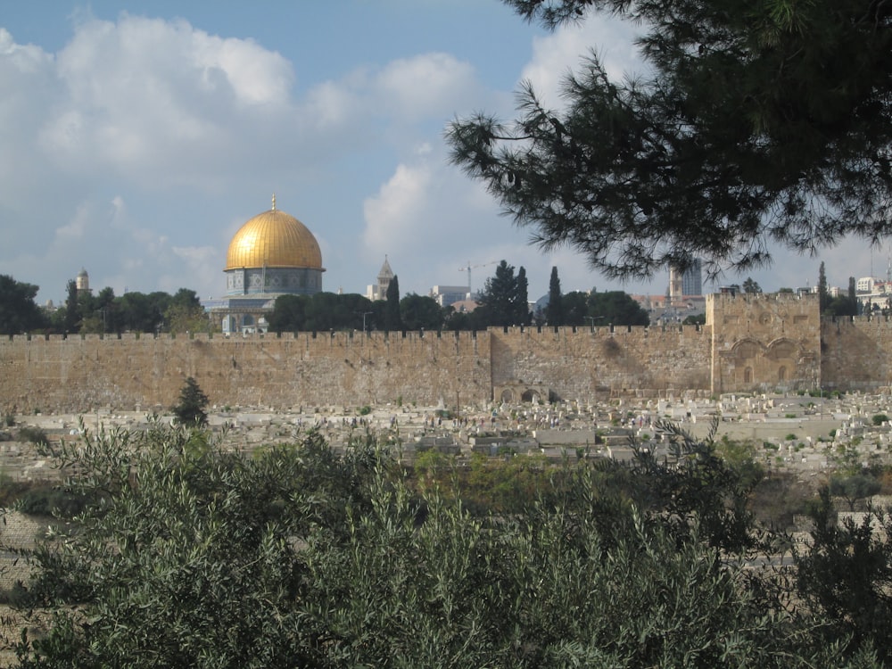 a large building with a gold dome