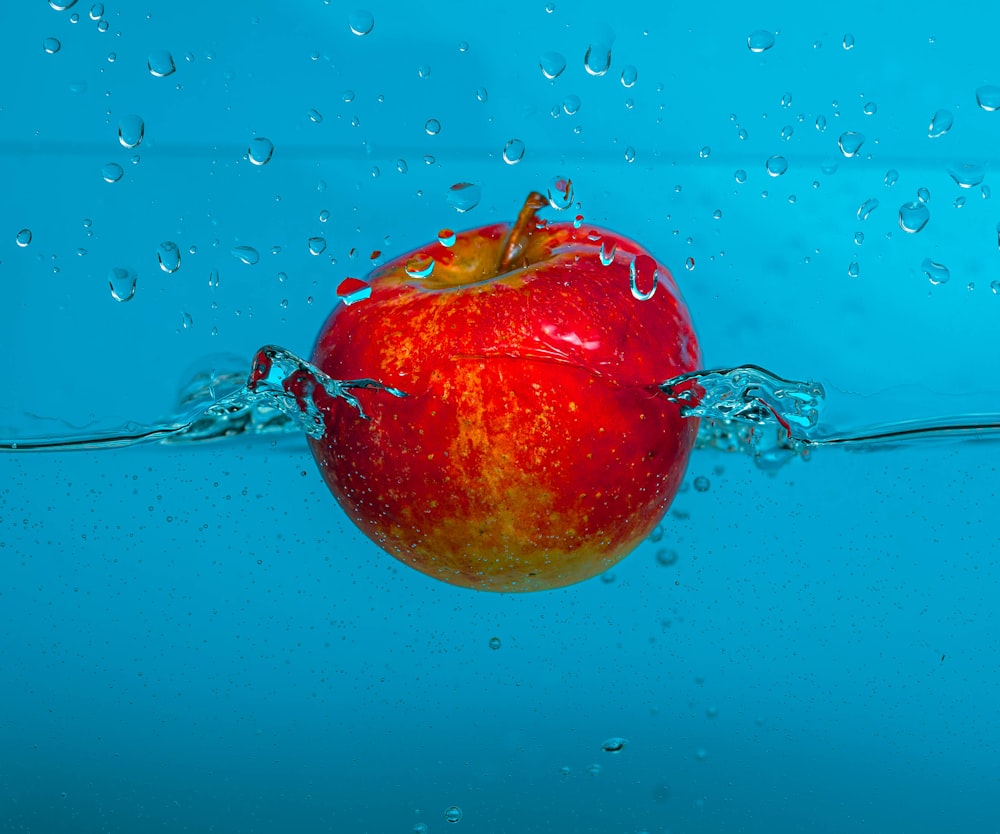 a red apple in water