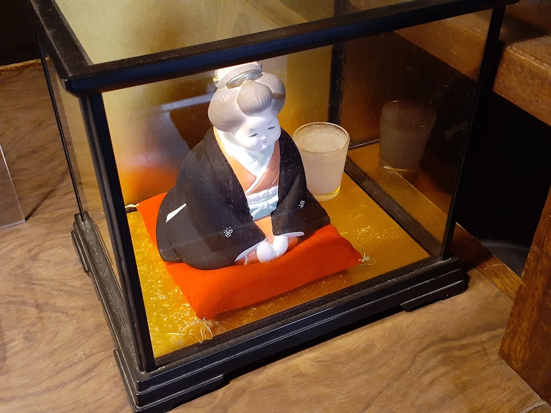 a figurine on a tray,