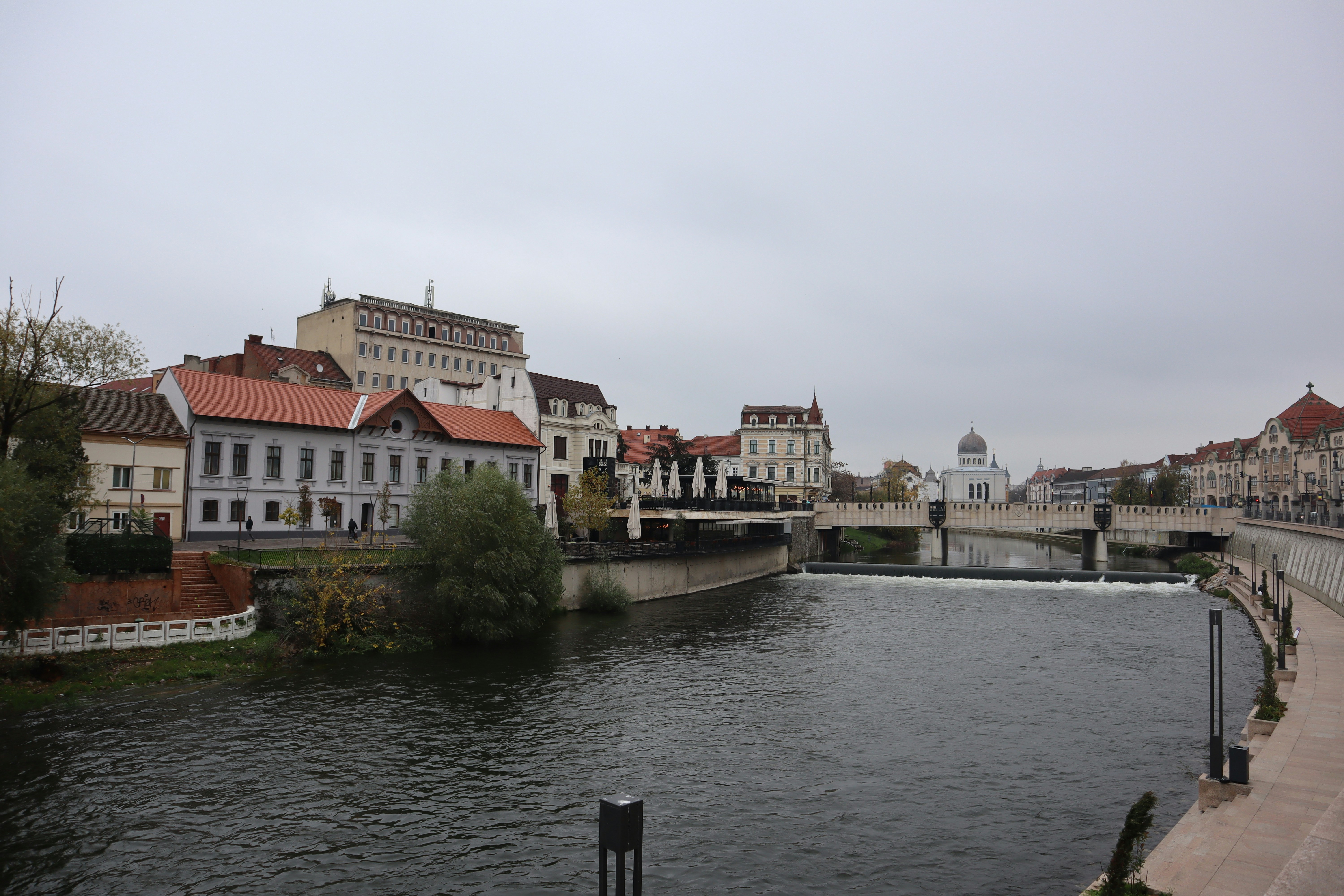 a body of water with buildings along it