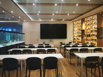 a room with tables and chairs