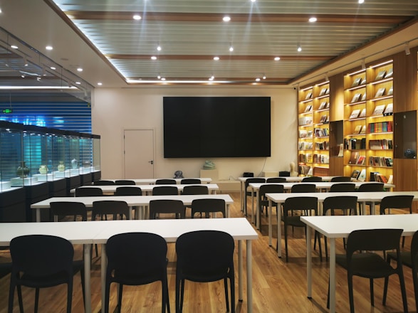 a room with tables and chairs