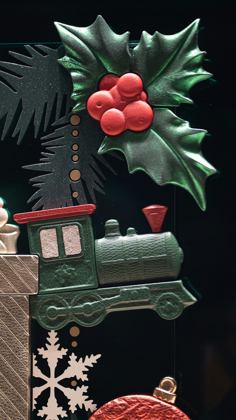 a close up of a christmas decoration with a train
