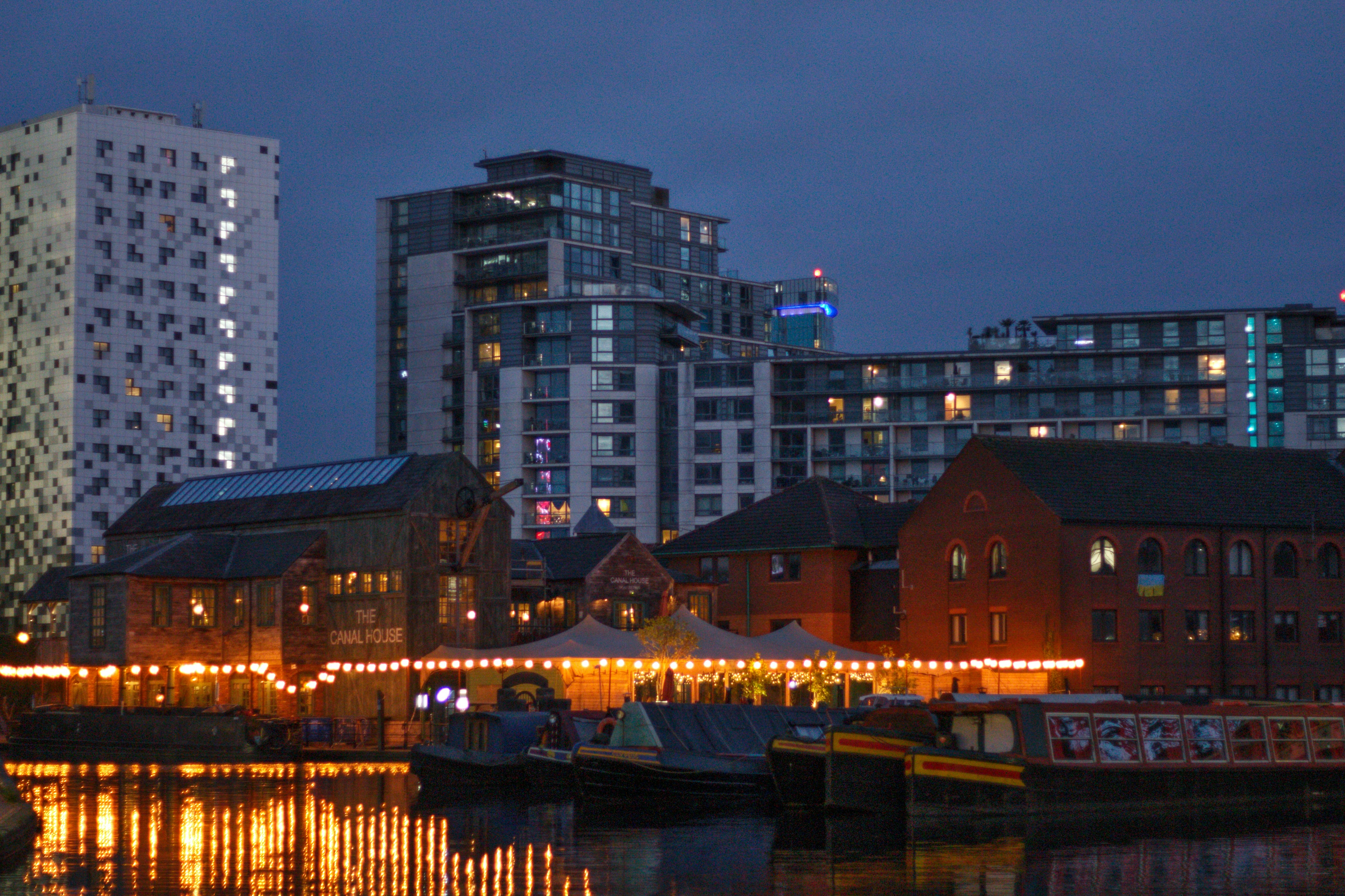 a body of water with buildings along it