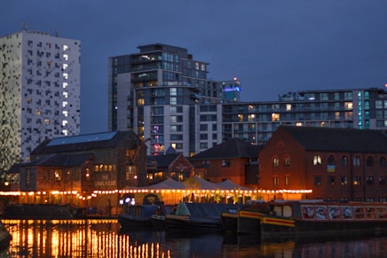 a body of water with buildings along it