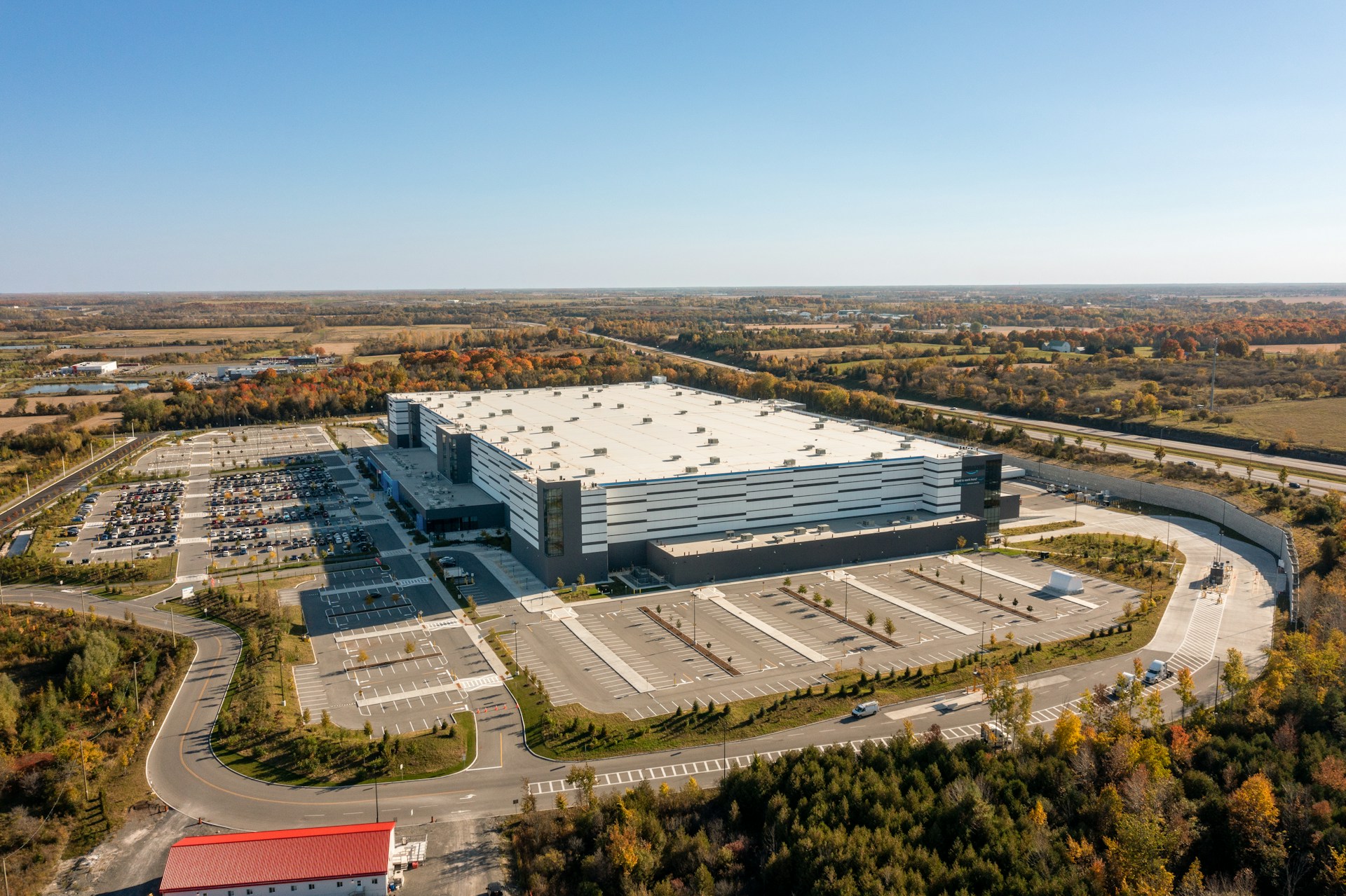 a large building with a parking lot