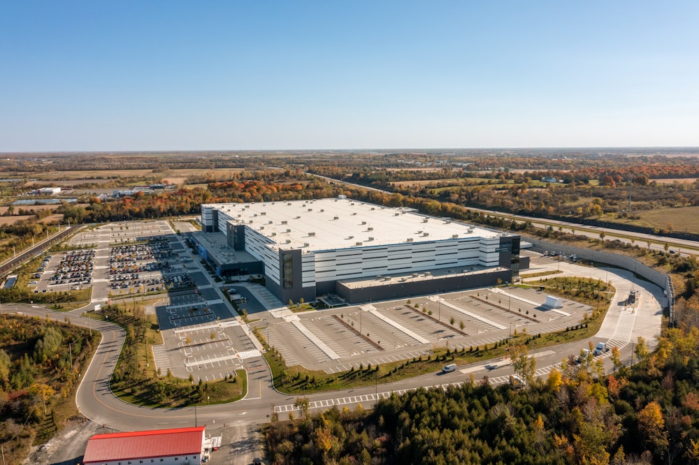 a large building with a parking lot