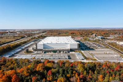 a large building with a parking lot