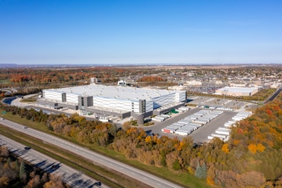 a large building with a parking lot