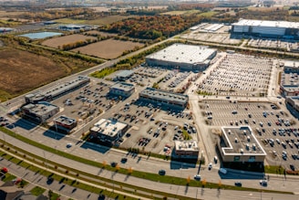 a large parking lot with many vehicles