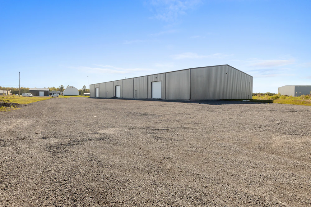Large warehouse building with loading doors