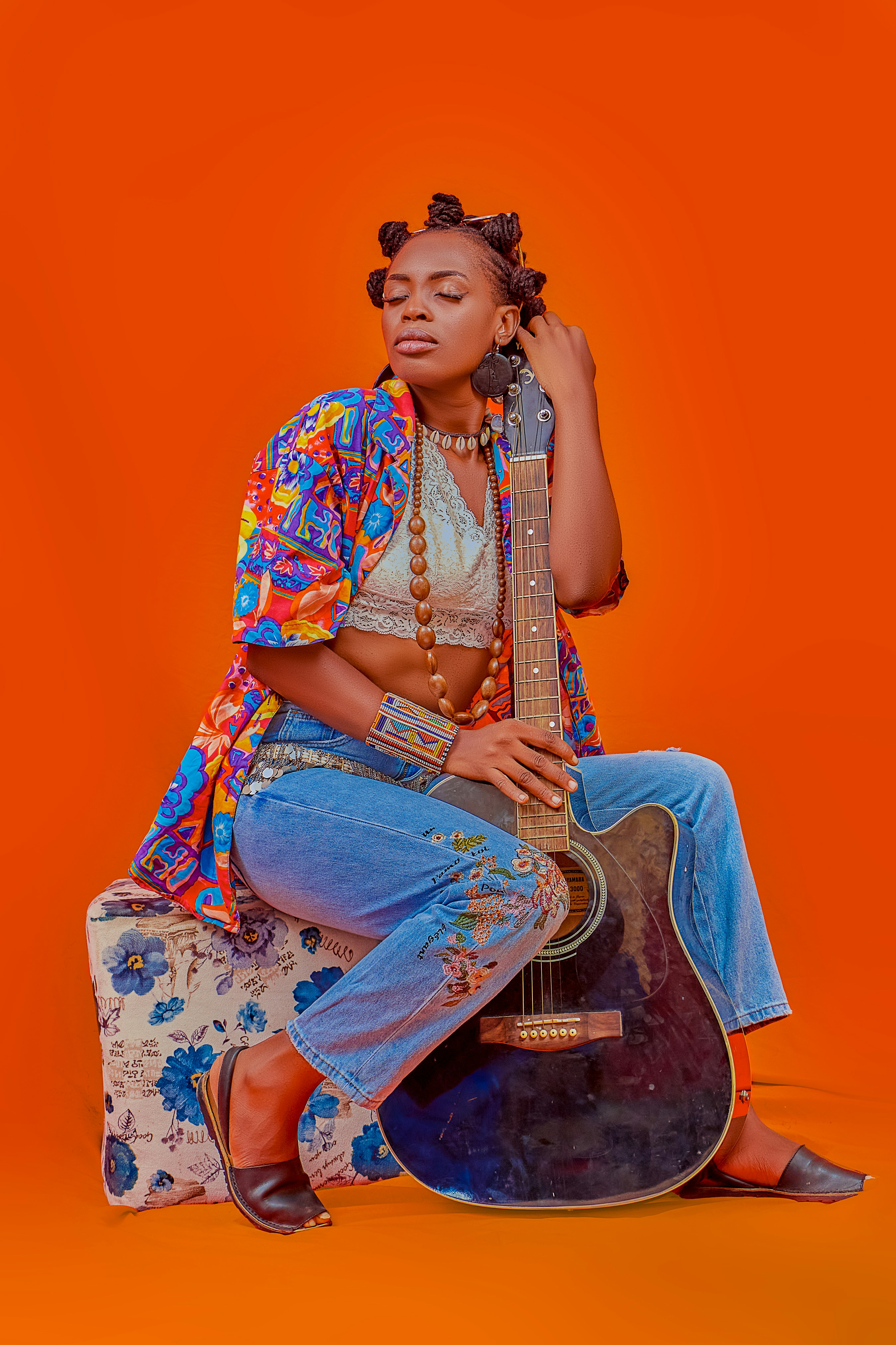 a person sitting on a stool