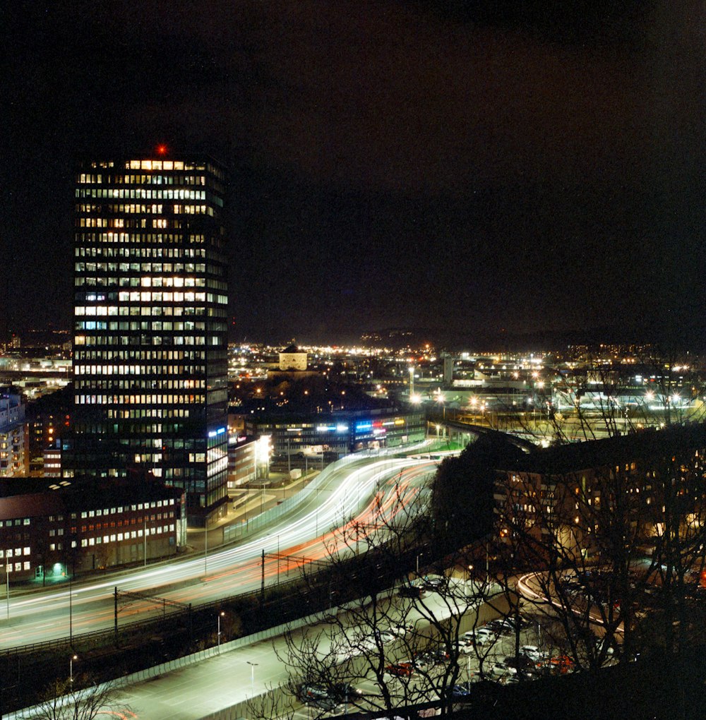 a tall building with lights at night