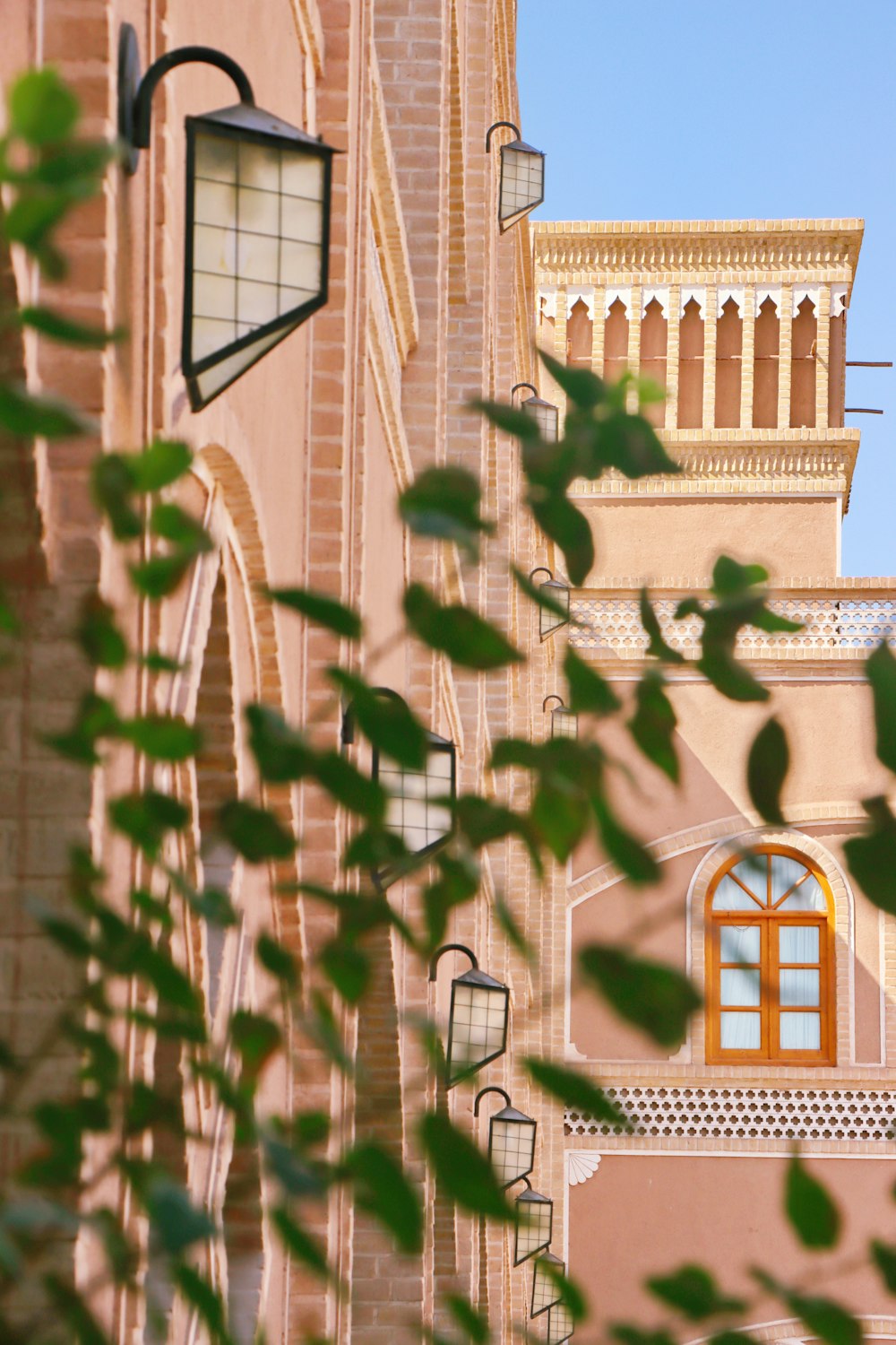 a brick building with a bell tower