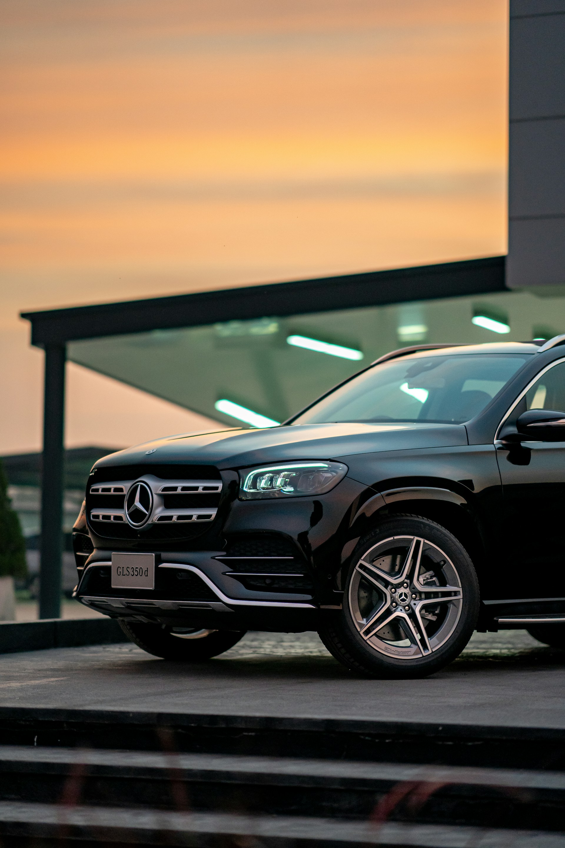 black and brown leather padded tub sofa