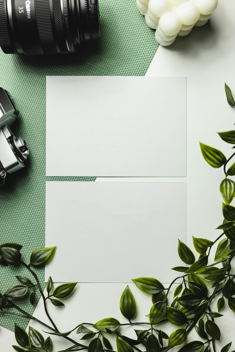 a white piece of paper on a green surface