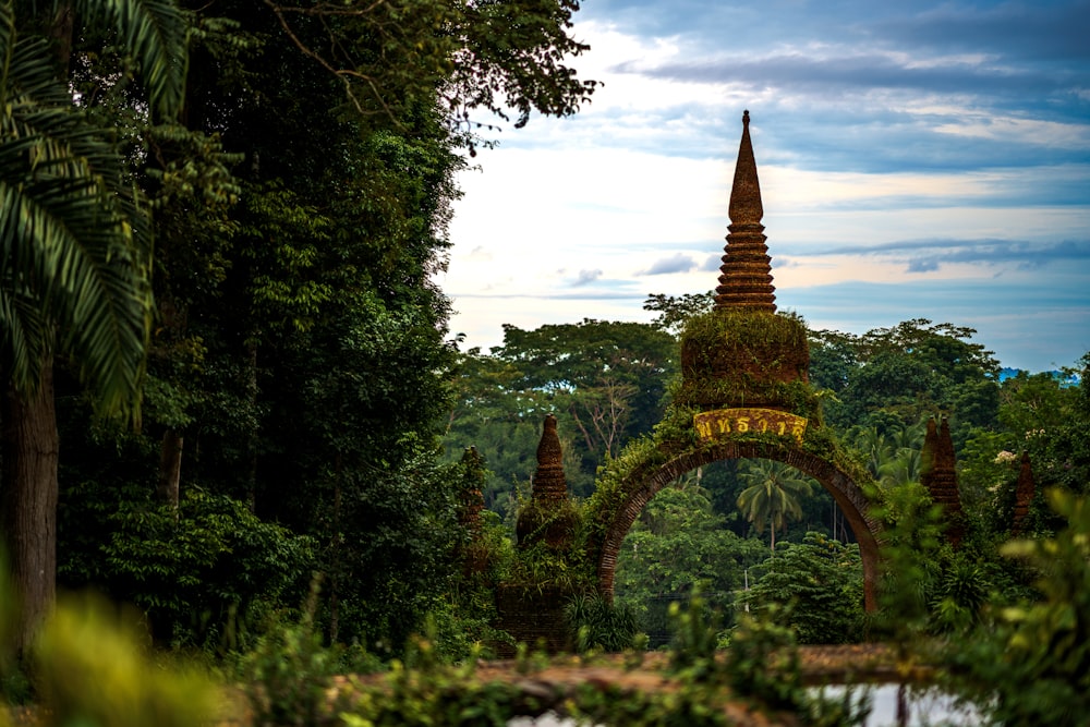 a tall tower surrounded by trees