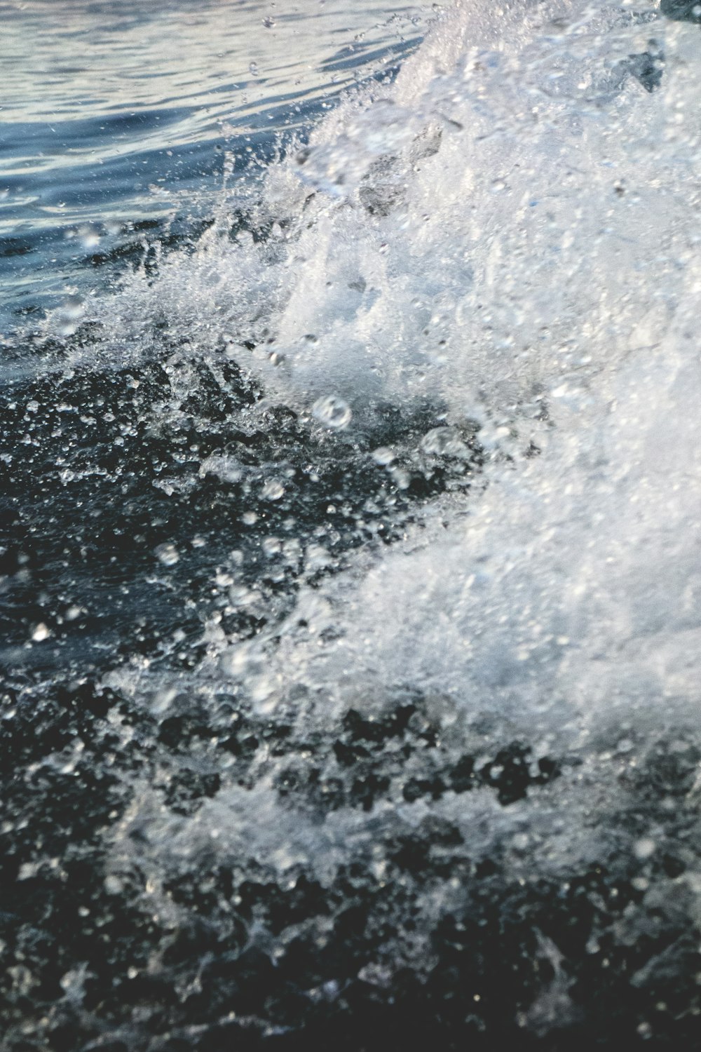 a wave crashing on a beach