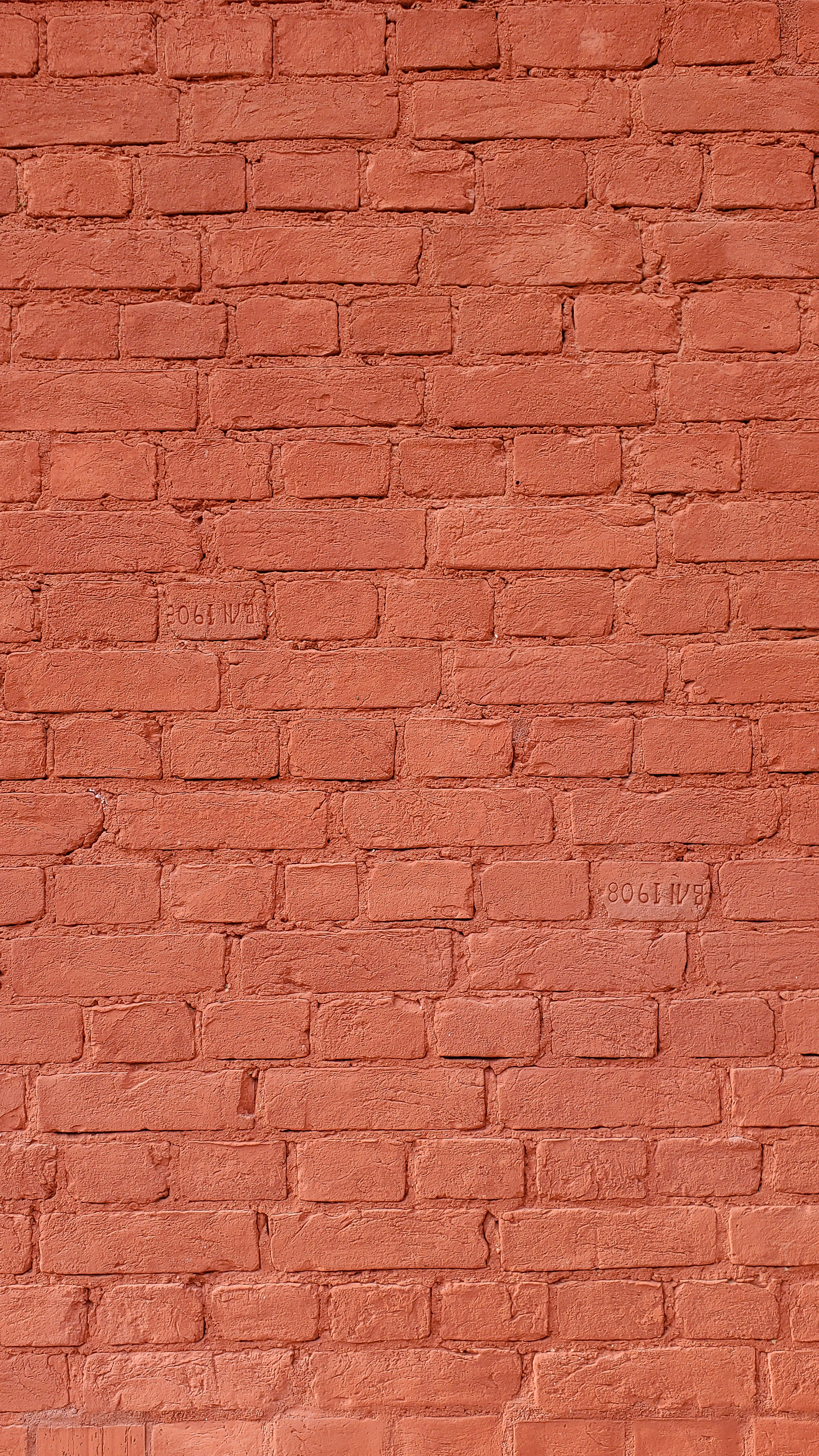 red painted brick wall