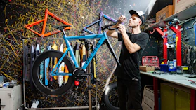 a man working on a bicycle