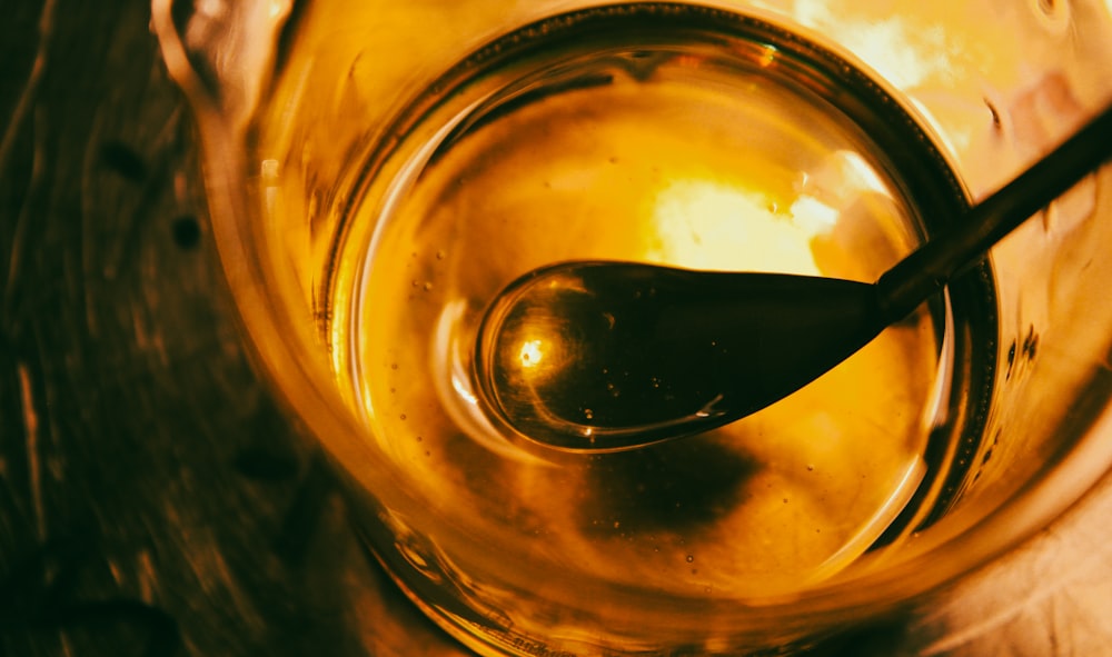 a close up of a glass of liquid