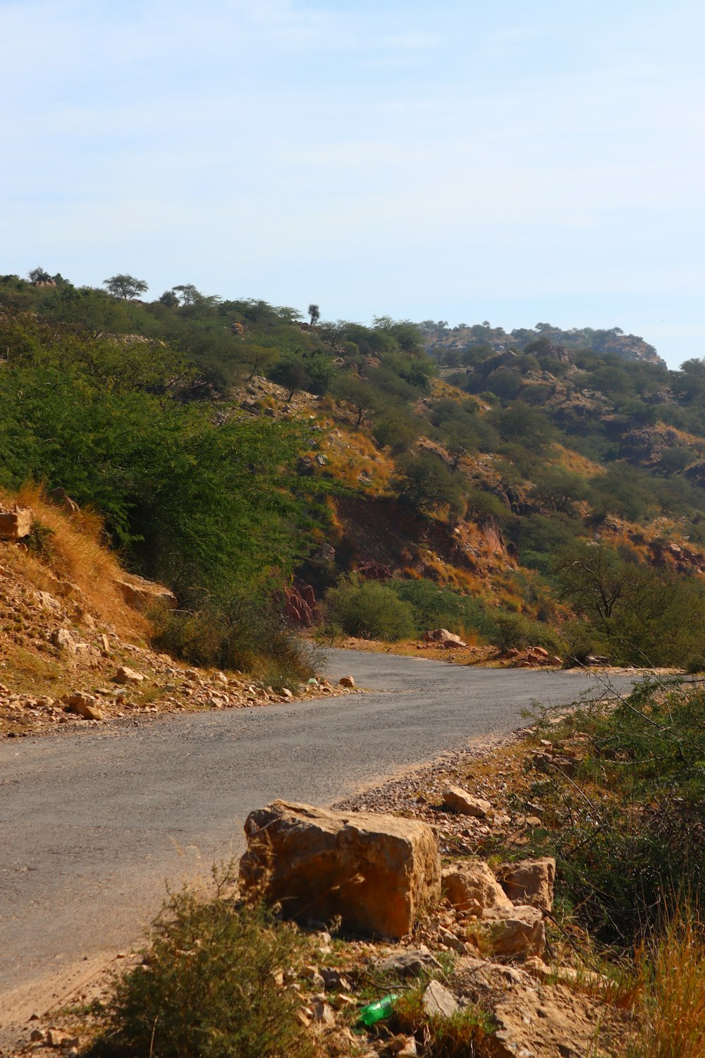 a road going through a hill