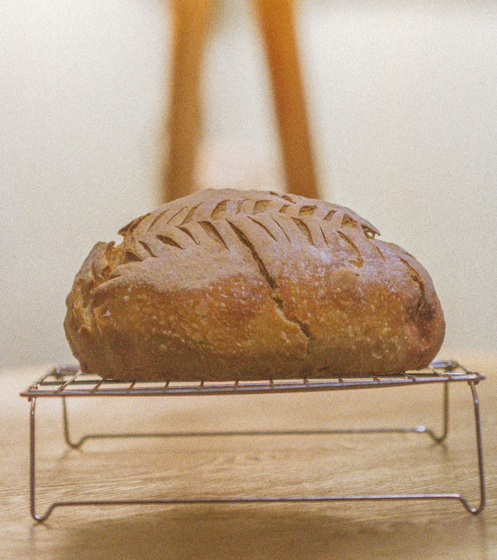 a loaf of bread on a wooden table