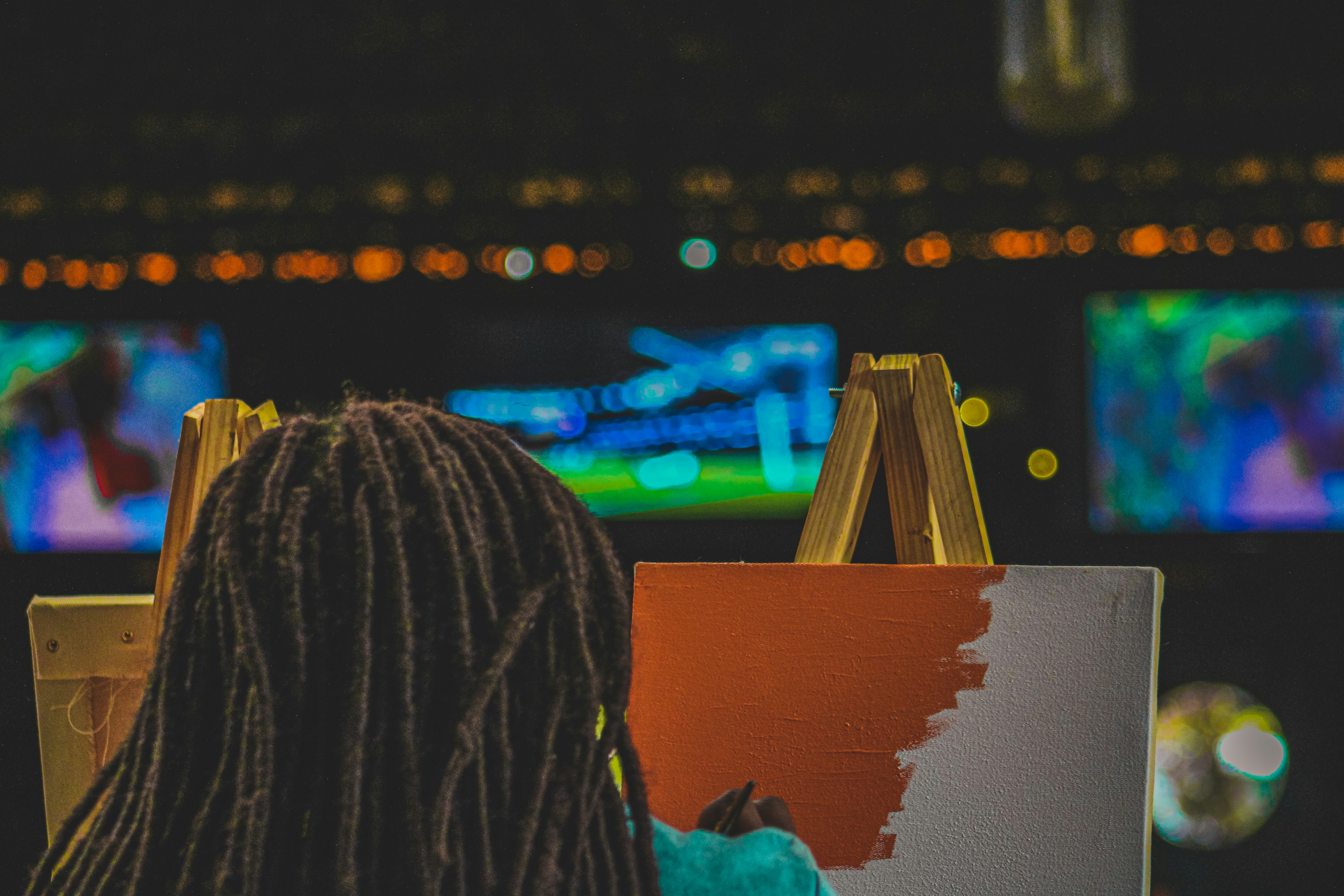 woman wearing yellow long-sleeved dress under white clouds and blue sky during daytime