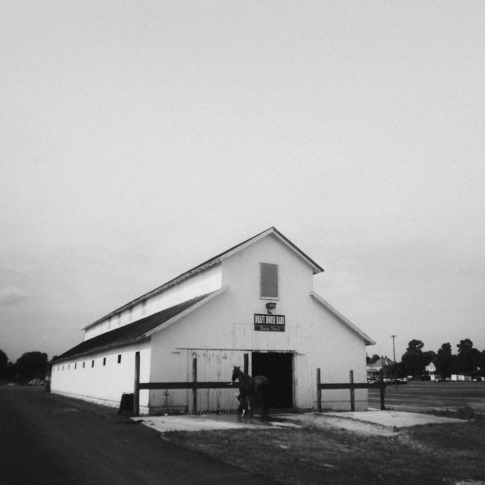 a white building with a fence around it