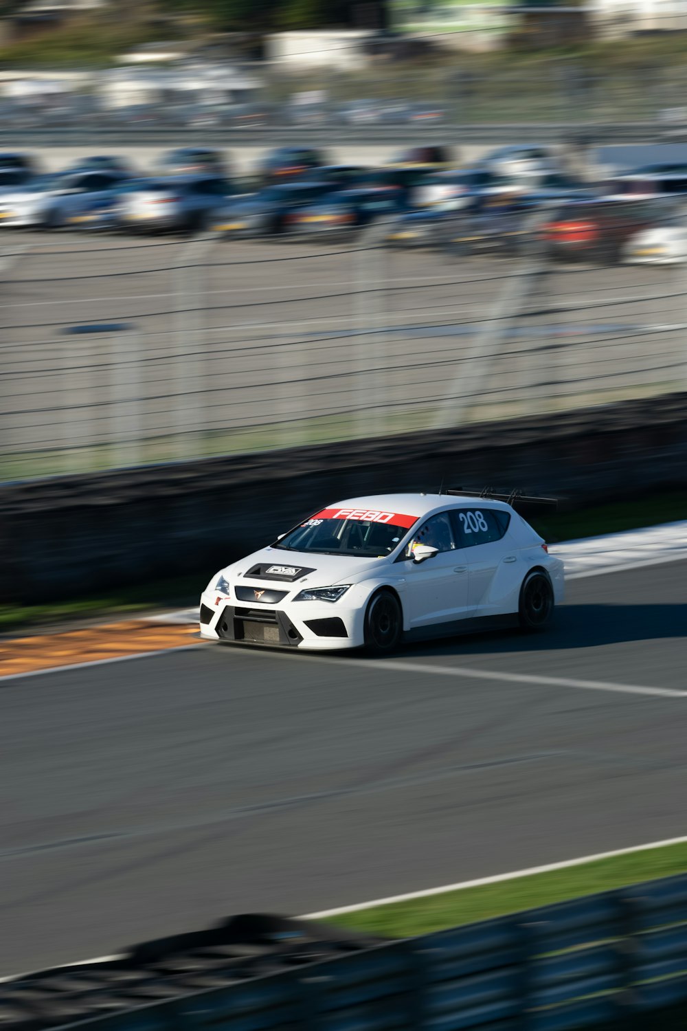a white car on a race track