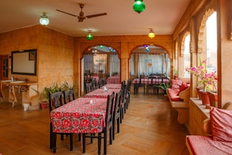 a room with tables and chairs
