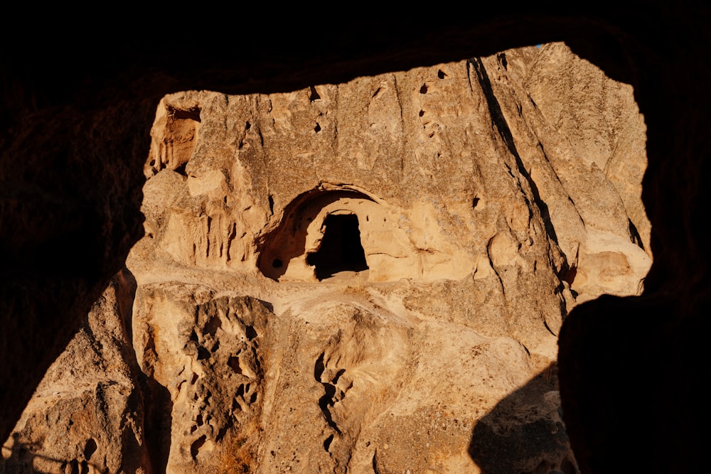 a rock formation with a hole in it