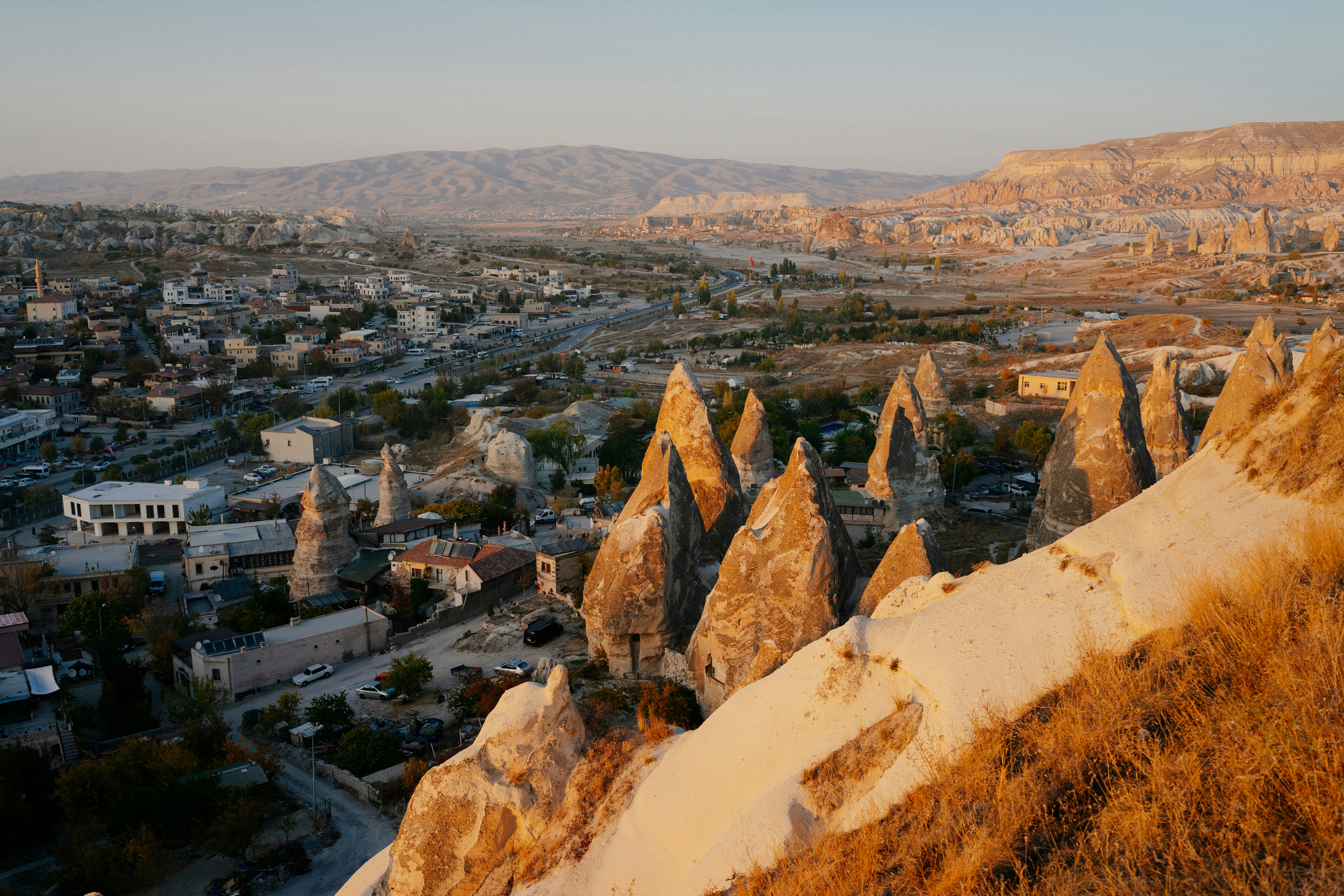 a city with a mountain in the background