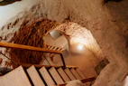 a wooden structure with a light inside